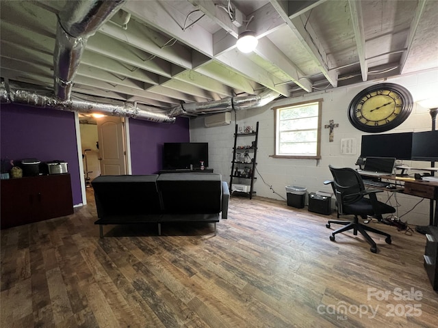 340 Cherry Mountain St, Forest City, NC 28043 - home office with hardwood / wood-style floors, a wall unit AC, and concrete block wall