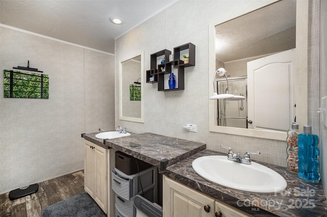 251 Birch Tree Rd, Clover, SC 29710 - full bathroom with wood finished floors, vanity, a textured ceiling, crown molding, and backsplash