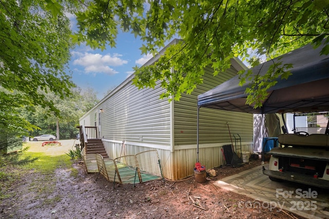 251 Birch Tree Rd, Clover, SC 29710 - view of side of property featuring a carport