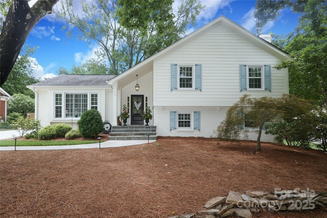 4126 Tyndale Ave, Charlotte, NC 28210 - tri-level home featuring brick siding