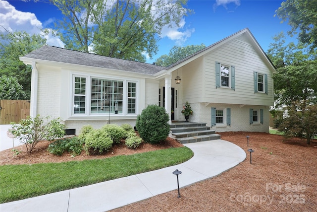 4126 Tyndale Ave, Charlotte, NC 28210 - tri-level home featuring brick siding and a shingled roof