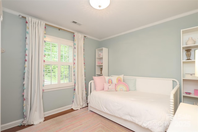 4126 Tyndale Ave, Charlotte, NC 28210 - bedroom with crown molding and wood finished floors