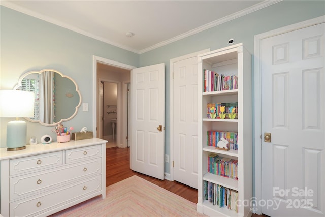 4126 Tyndale Ave, Charlotte, NC 28210 - bedroom featuring wood finished floors, ornamental molding, and a closet