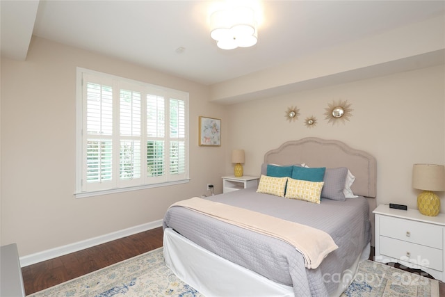 4126 Tyndale Ave, Charlotte, NC 28210 - bedroom with baseboards and wood finished floors