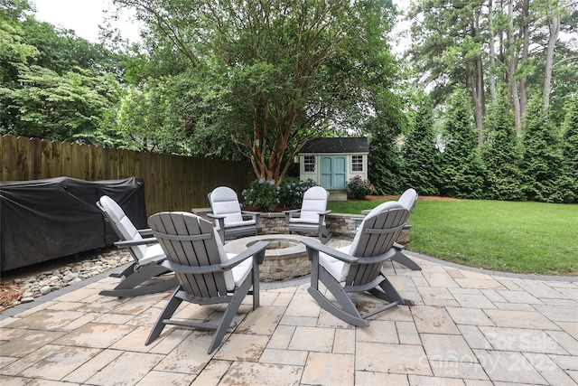 4126 Tyndale Ave, Charlotte, NC 28210 - view of patio / terrace with an outdoor fire pit and a shed