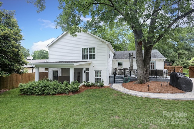 4126 Tyndale Ave, Charlotte, NC 28210 - rear view of property featuring a wooden deck, brick siding, and a shingled roof