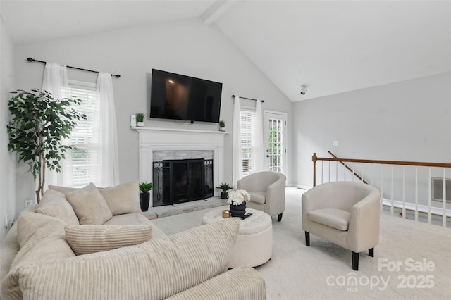 2308 Blair House Ct, Charlotte, NC 28270 - carpeted living area featuring beam ceiling, high vaulted ceiling, and a premium fireplace