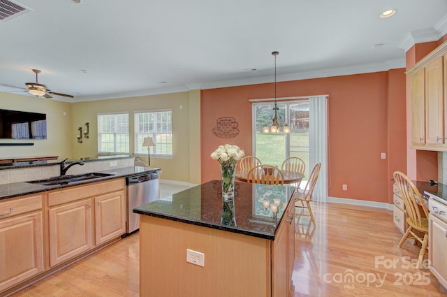 604 Palmerston Ln, Waxhaw, NC 28173 - kitchen featuring light brown cabinetry, light wood finished floors, dishwasher, plenty of natural light, and crown molding