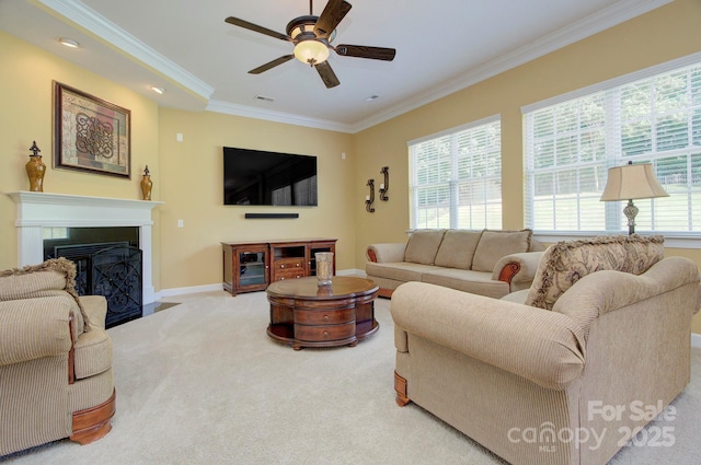 604 Palmerston Ln, Waxhaw, NC 28173 - living room featuring crown molding, carpet, a fireplace with flush hearth, and a ceiling fan