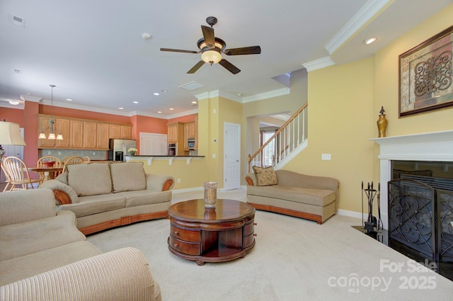 604 Palmerston Ln, Waxhaw, NC 28173 - living room featuring ceiling fan, stairway, recessed lighting, crown molding, and light carpet