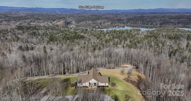 4933 NC Highway 268 W, Wilkesboro, NC 28697 - aerial view of property and surrounding area featuring a heavily wooded area and a water and mountain view
