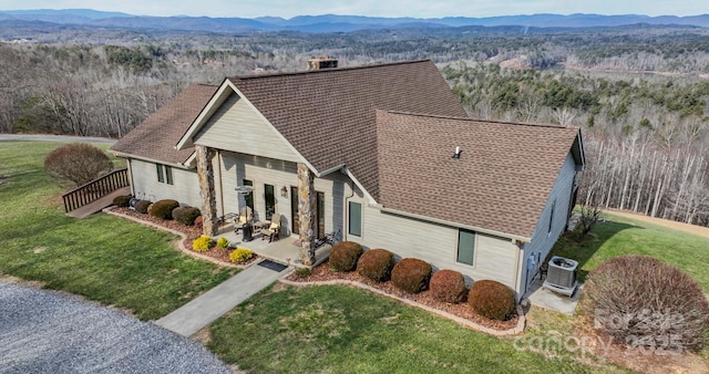 4933 NC Highway 268 W, Wilkesboro, NC 28697 - view of front of house featuring a chimney, cooling unit, a front yard, and a mountain view