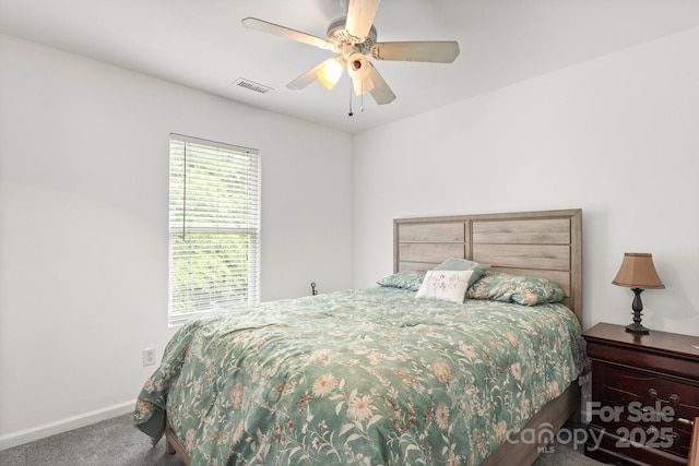 9236 Clifton Meadow Dr, Matthews, NC 28105 - carpeted bedroom featuring baseboards and ceiling fan