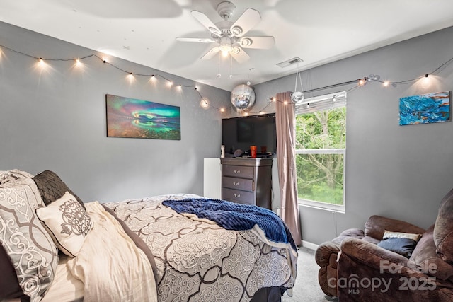 9236 Clifton Meadow Dr, Matthews, NC 28105 - carpeted bedroom with baseboards and ceiling fan
