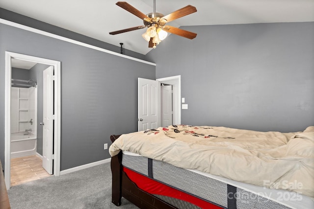 9236 Clifton Meadow Dr, Matthews, NC 28105 - bedroom with carpet floors, a ceiling fan, a high ceiling, ensuite bath, and a barn door