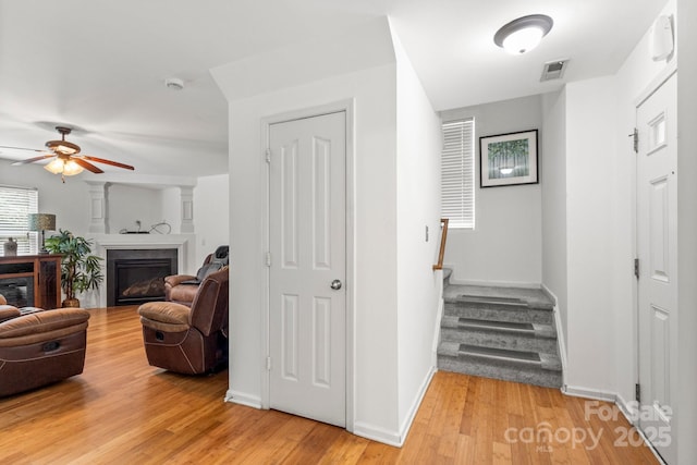 9236 Clifton Meadow Dr, Matthews, NC 28105 - hall with light wood-style flooring and stairway