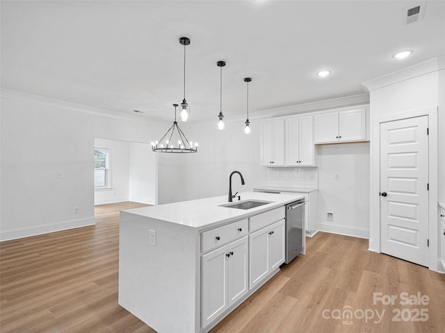 8303 Adrian Ct, Charlotte, NC 28270 - kitchen featuring a sink, stainless steel dishwasher, white cabinetry, light wood-type flooring, and crown molding
