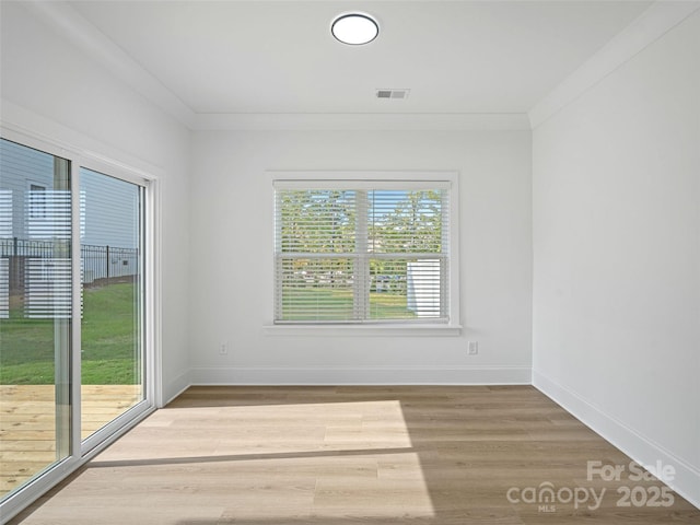 8303 Adrian Ct, Charlotte, NC 28270 - spare room featuring wood finished floors and baseboards
