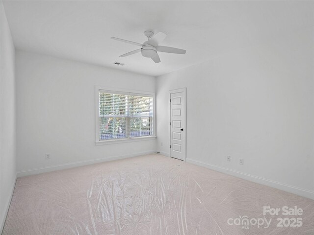 8303 Adrian Ct, Charlotte, NC 28270 - carpeted spare room with a ceiling fan and baseboards