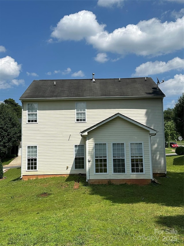 8125 Weeping Fig Ln, Charlotte, NC 28215 - rear view of property with a lawn