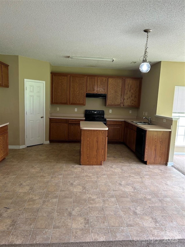 8125 Weeping Fig Ln, Charlotte, NC 28215 - kitchen with under cabinet range hood, black appliances, brown cabinetry, a textured ceiling, and light countertops