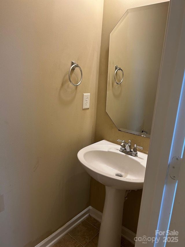 8125 Weeping Fig Ln, Charlotte, NC 28215 - bathroom featuring tile patterned floors and baseboards