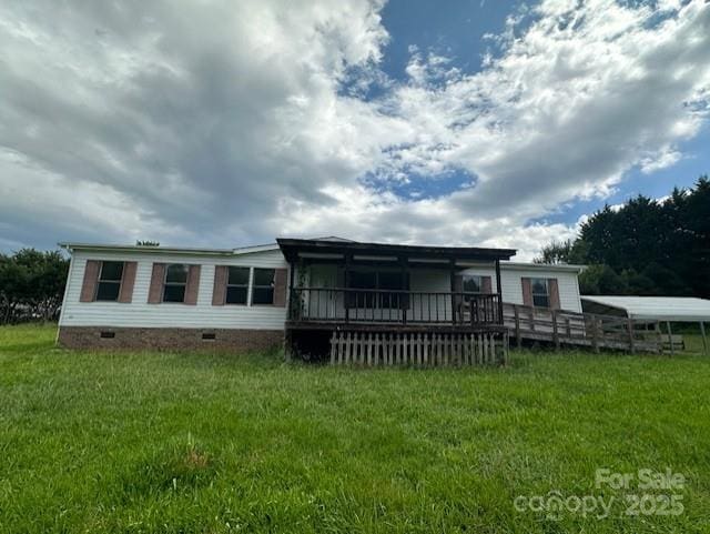 5587 Doe Ct, Morganton, NC 28655 - rear view of property with crawl space, a yard, and a wooden deck