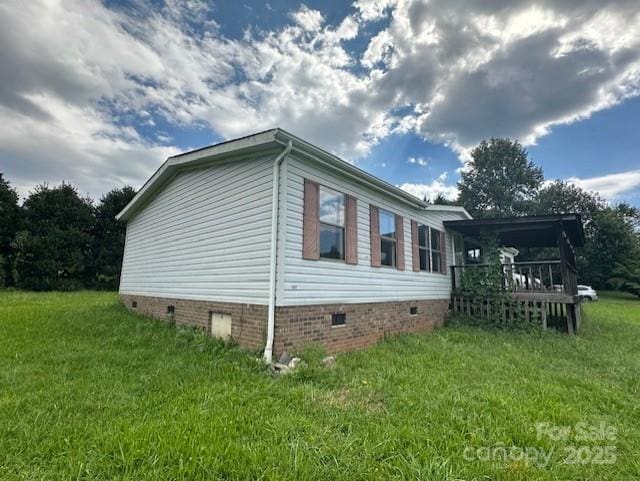 5587 Doe Ct, Morganton, NC 28655 - view of side of home featuring crawl space and a lawn