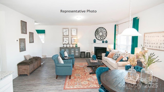 145 Apple Orchard Ct, Statesville, NC 28677 - living area with wood finished floors and a fireplace