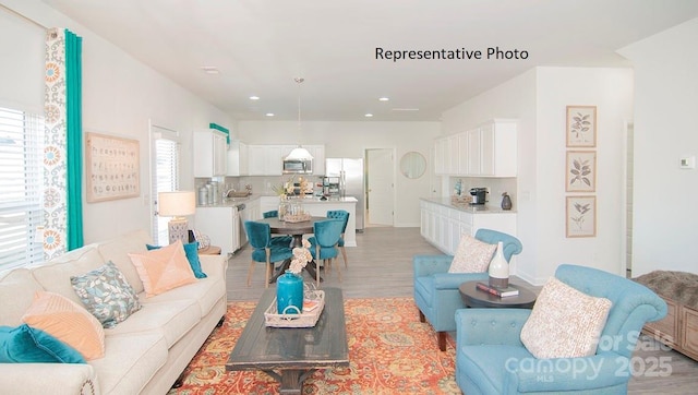 145 Apple Orchard Ct, Statesville, NC 28677 - living area with light wood-style flooring and recessed lighting
