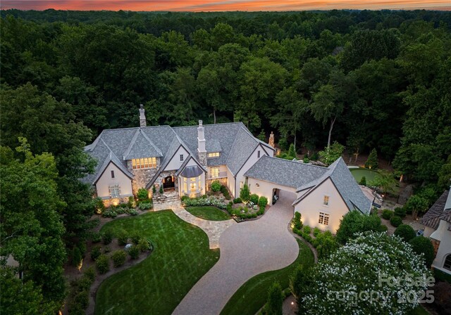 8500 Longview Club Dr, Waxhaw, NC 28173 - aerial view of property and surrounding area featuring a heavily wooded area