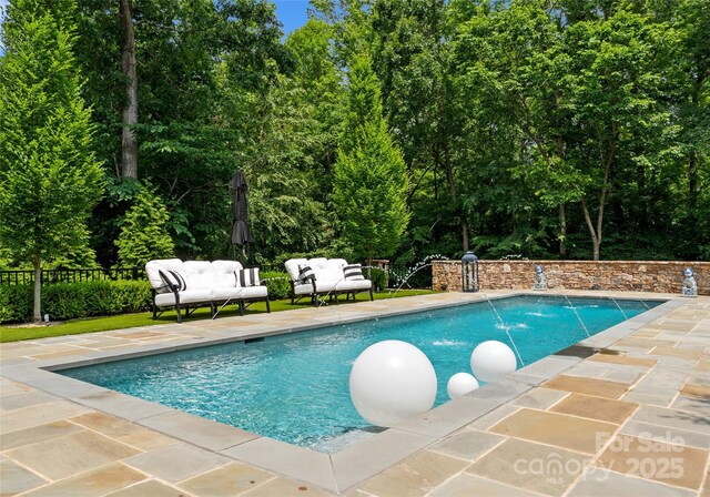 8500 Longview Club Dr, Waxhaw, NC 28173 - view of swimming pool featuring outdoor lounge area and a patio