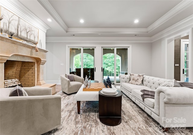 8500 Longview Club Dr, Waxhaw, NC 28173 - living area featuring a tray ceiling, wood finished floors, and crown molding