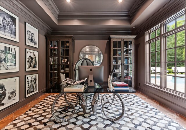 8500 Longview Club Dr, Waxhaw, NC 28173 - home office featuring tile patterned flooring, ornamental molding, and a tray ceiling