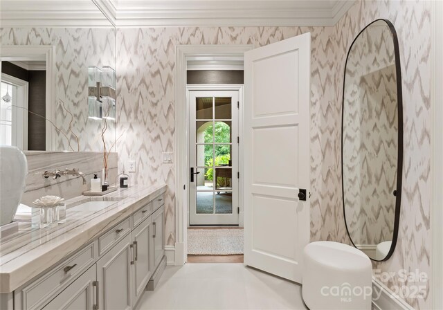 8500 Longview Club Dr, Waxhaw, NC 28173 - bathroom featuring wallpapered walls, vanity, and ornamental molding