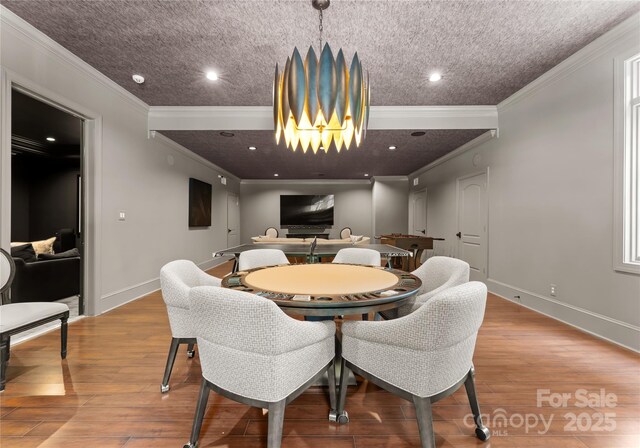 8500 Longview Club Dr, Waxhaw, NC 28173 - dining space with wood finished floors, ornamental molding, and recessed lighting