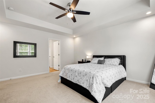 4209 Grier St, Gastonia, NC 28056 - bedroom featuring light colored carpet, baseboards, recessed lighting, a tray ceiling, and a ceiling fan