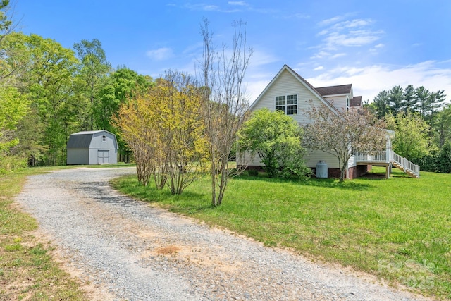 1285 Waitman Rd, Lexington, NC 27295 - view of front facade featuring a front lawn, stairs, and driveway