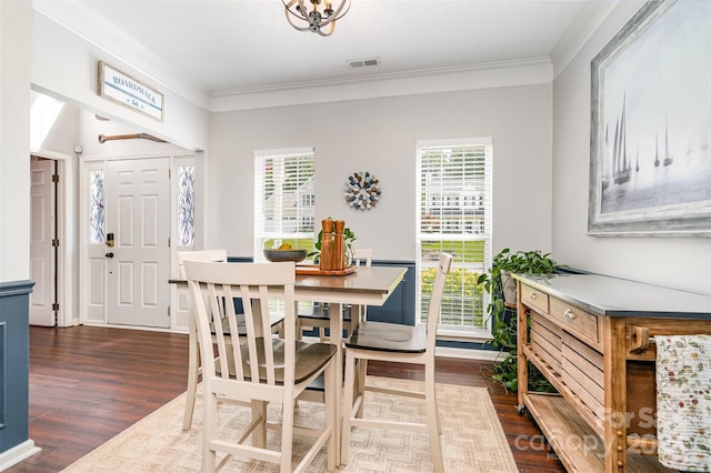 108 Shade Tree Cir, Fort Mill, SC 29715 - dining area featuring dark wood-type flooring, crown molding, and healthy amount of natural light