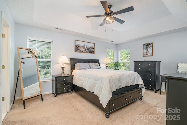 108 Shade Tree Cir, Fort Mill, SC 29715 - bedroom with a raised ceiling, light carpet, and a ceiling fan