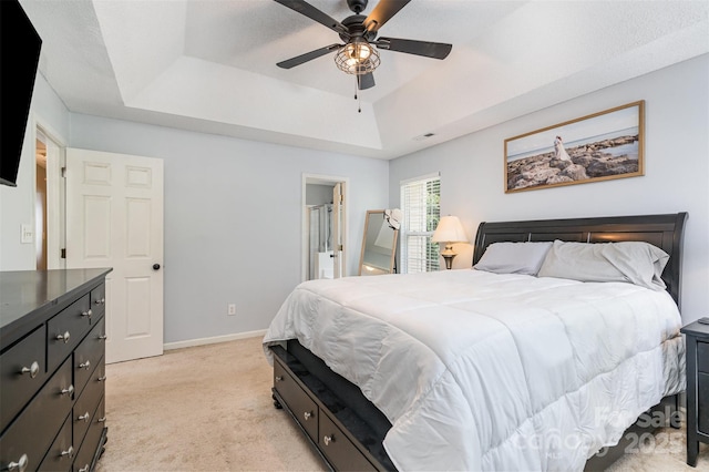 108 Shade Tree Cir, Fort Mill, SC 29715 - bedroom featuring a raised ceiling, light carpet, and a ceiling fan