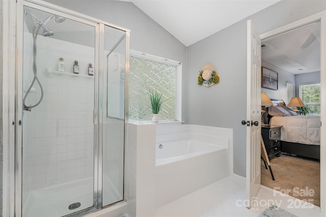 108 Shade Tree Cir, Fort Mill, SC 29715 - bathroom with ensuite bath, a bath, a shower stall, and vaulted ceiling