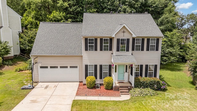 108 Shade Tree Cir, Fort Mill, SC 29715 - colonial home with driveway, a front lawn, a shingled roof, and an attached garage