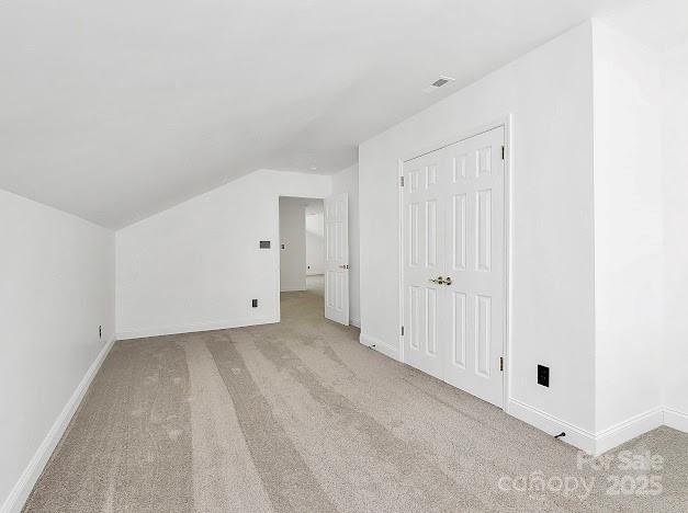 12300 Caldwell Rd, Charlotte, NC 28213 - additional living space with light carpet and lofted ceiling