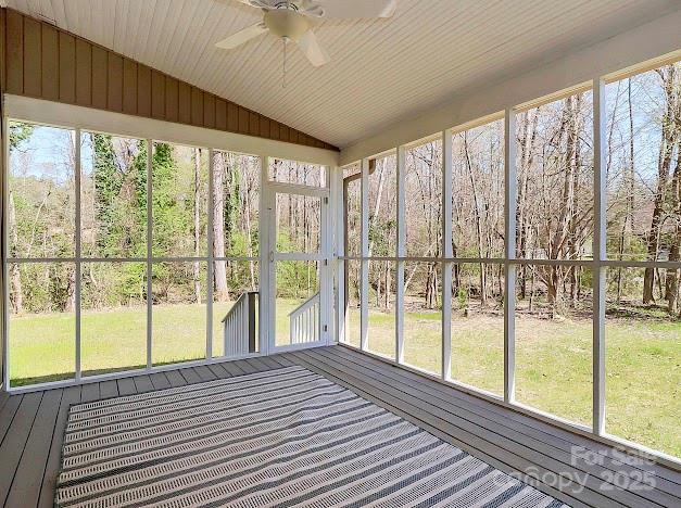 12300 Caldwell Rd, Charlotte, NC 28213 - unfurnished sunroom with a ceiling fan, lofted ceiling, and plenty of natural light