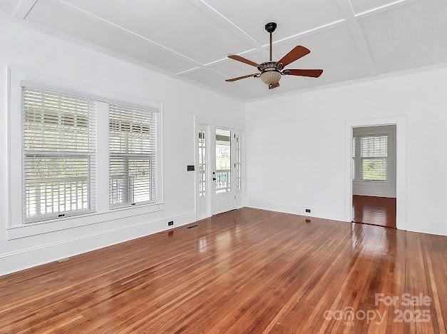 12300 Caldwell Rd, Charlotte, NC 28213 - spare room featuring wood finished floors and a ceiling fan