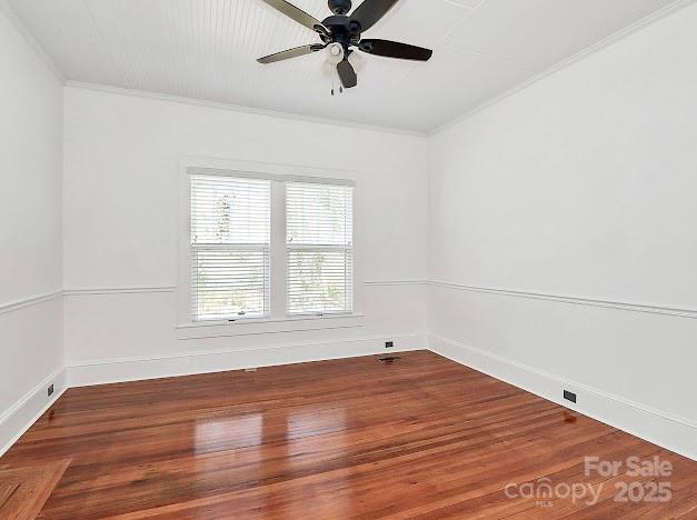 12300 Caldwell Rd, Charlotte, NC 28213 - spare room with crown molding, ceiling fan, and wood finished floors