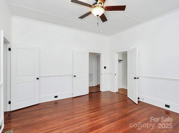 12300 Caldwell Rd, Charlotte, NC 28213 - unfurnished bedroom with wood finished floors and ceiling fan