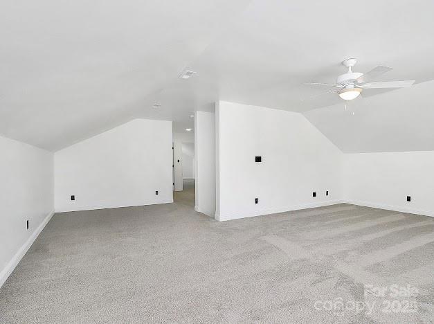 12300 Caldwell Rd, Charlotte, NC 28213 - bonus room with lofted ceiling, carpet floors, and ceiling fan