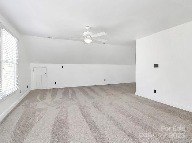 12300 Caldwell Rd, Charlotte, NC 28213 - bonus room with a ceiling fan and carpet flooring